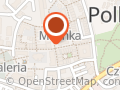 Figura siedzącego na ławce górnika.